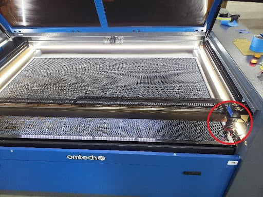 laser beam alignment tape on laser mirror guide hole